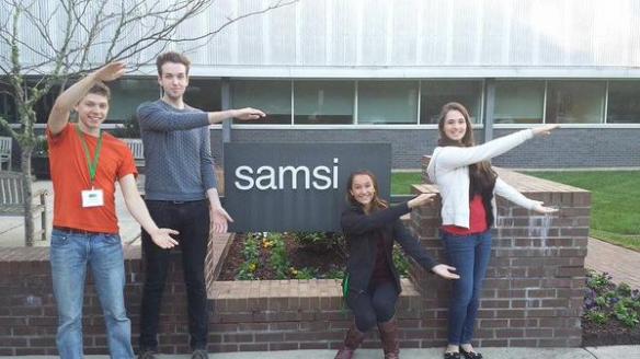 students by SAMSI sign